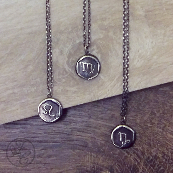 Strega style assortment of Zodiac pendants by Fennel & Clark